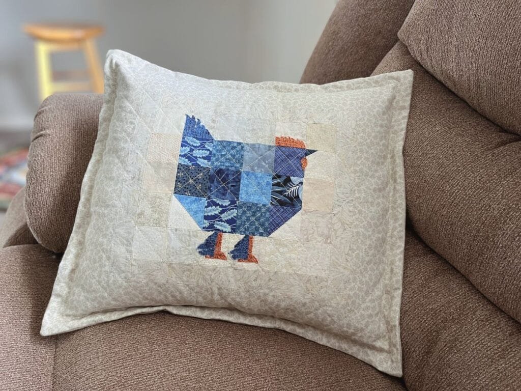 feather footed quilted chicken pillow sham