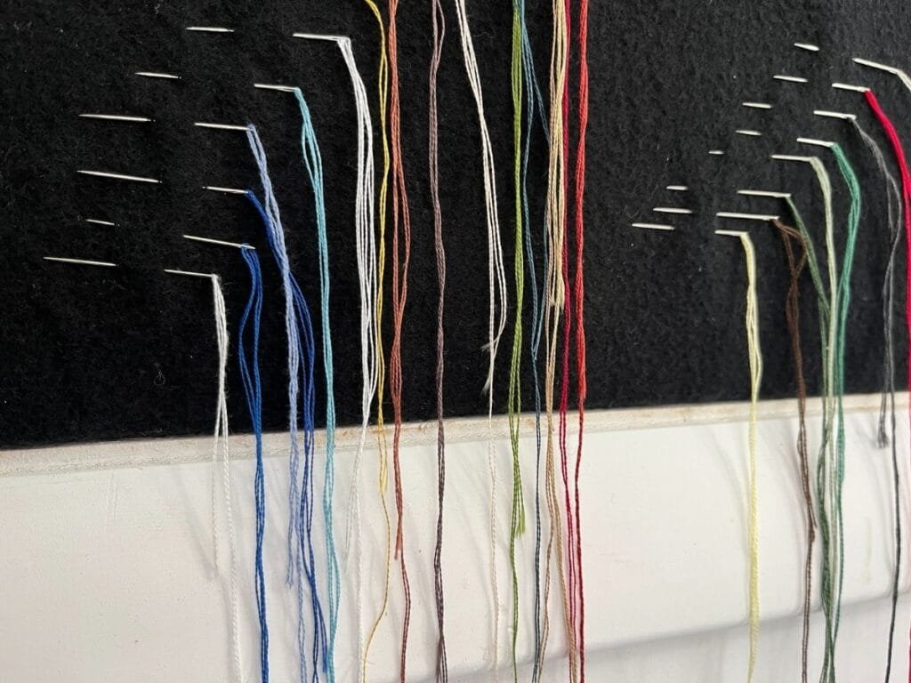 embroidery floss on needles