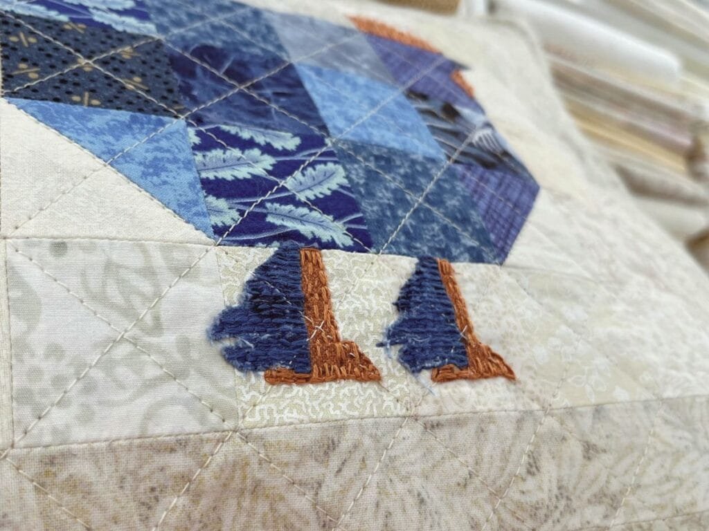 feather foot slow stitching details of chicken block