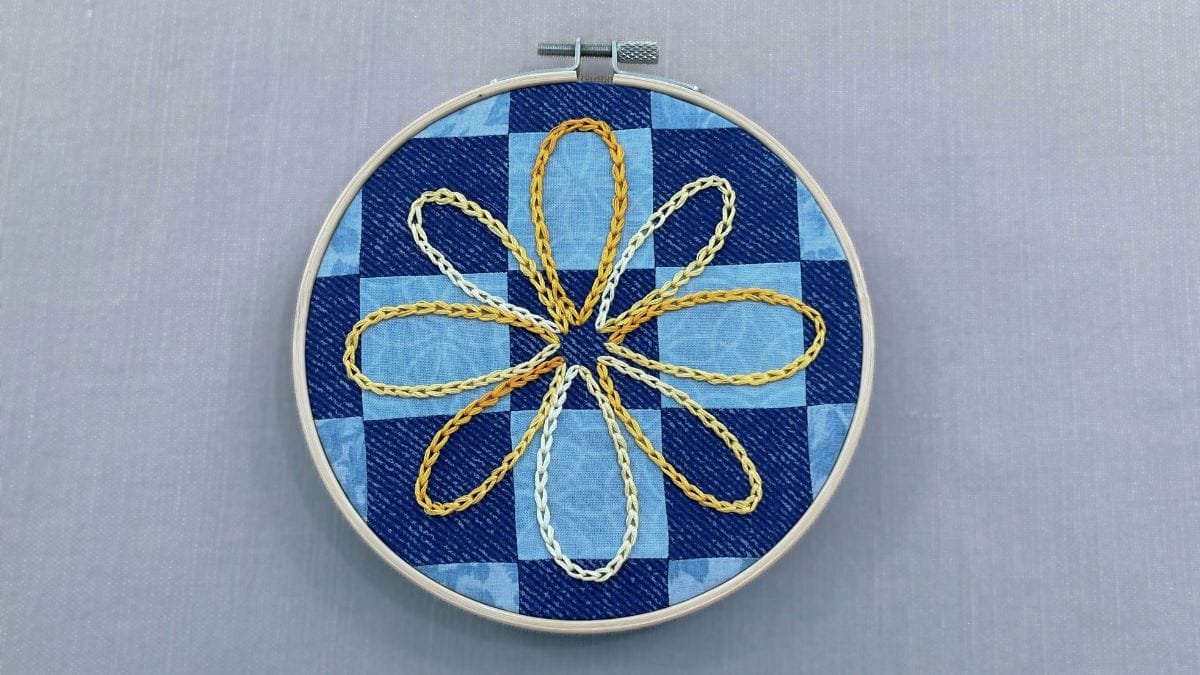 Quick Chain Stitch Flower on a Patchwork Quilt Block
